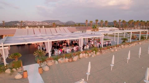 Aerial drone view captures the vibrant evening atmosphere of a Mediterranean. Stock Footage 265844352