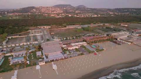 Aerial drone view captures the vibrant evening atmosphere of a Mediterranean. Stock Footage 265844538