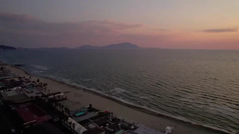 Aerial drone view captures the vibrant evening atmosphere of a Mediterranean. Stock Footage 265844561