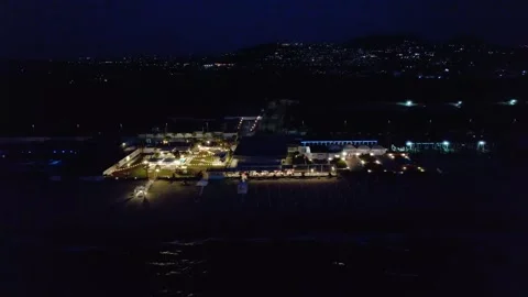 Aerial drone view captures the vibrant evening atmosphere of a Mediterranean. Stock Footage 265844652