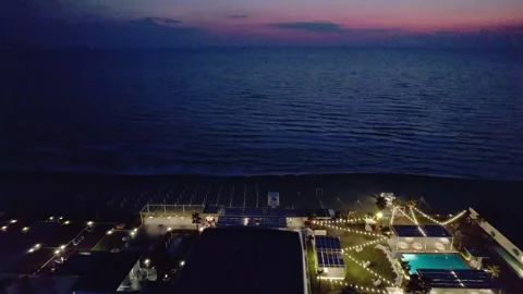 Aerial drone view captures the vibrant evening atmosphere of a Mediterranean. Stock Footage 265844712