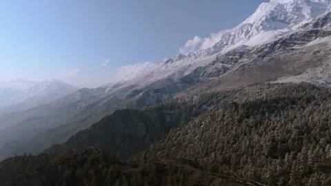 Aerial drone view capturing the pristine snow peaks of Annapurna mountain range. Stock Footage 311018640