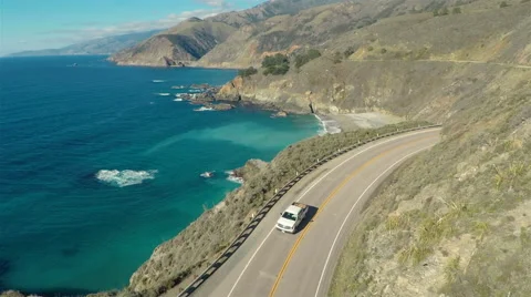 Aerial drone view of car driving down Stock Video Pond5