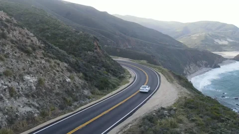 Aerial drone view of car driving on Pacific Coast Highway near Big Sur, Video stock 159593767
