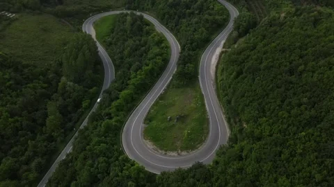 Aerial Drone View Car Driving on Curvy Mountain asphalt Road in summer 스톡 동영상 244883209