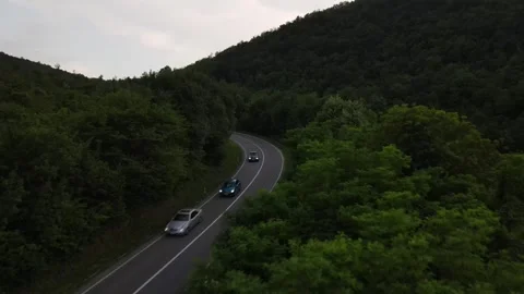Aerial Drone View Car Driving on Curvy Mountain asphalt Road in summer 스톡 동영상 245457674