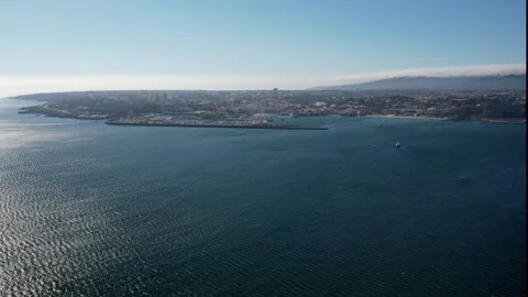 Aerial drone view of Cascais peninsula with Sintra mountains in the background Stock Footage 201757065
