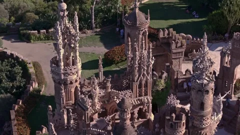 Aerial Drone View of Castillo de Colomares Carved Spires Up Close, Benalmádena Stock Footage 335446528