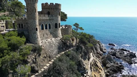 Aerial drone view, castle in Lloret de Mar, rocks, cliffs, beach, mountains, 4K Stock Footage 274852268
