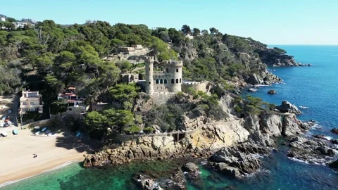 Aerial drone view, castle in Lloret de Mar, rocks, cliffs, beach, mountains, 4K Stock Footage 274852277