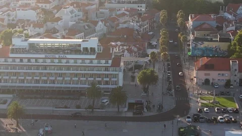 Aerial drone view of centre of Cascais, Portugal with the iconic Hotel Baia on Stock Footage 245242464