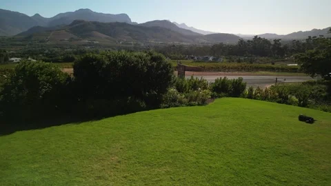 Aerial drone view of centuries old vineyards at Franschhoek, Western Cape Stock Footage 271193143