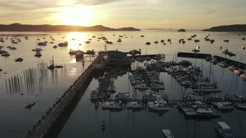 Aerial drone view of Chalong Pier during sunrise in Phuket, Thailand Stock-Footage 263397152
