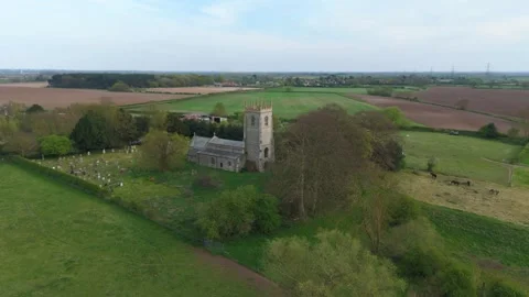 Aerial drone view Church cathedral England UK countryside rural area secluded Stock Footage 307494242