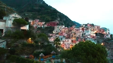Aerial drone view of Cinque Terre Manarola romantic village at sunset, Italy Stock Footage 131224949