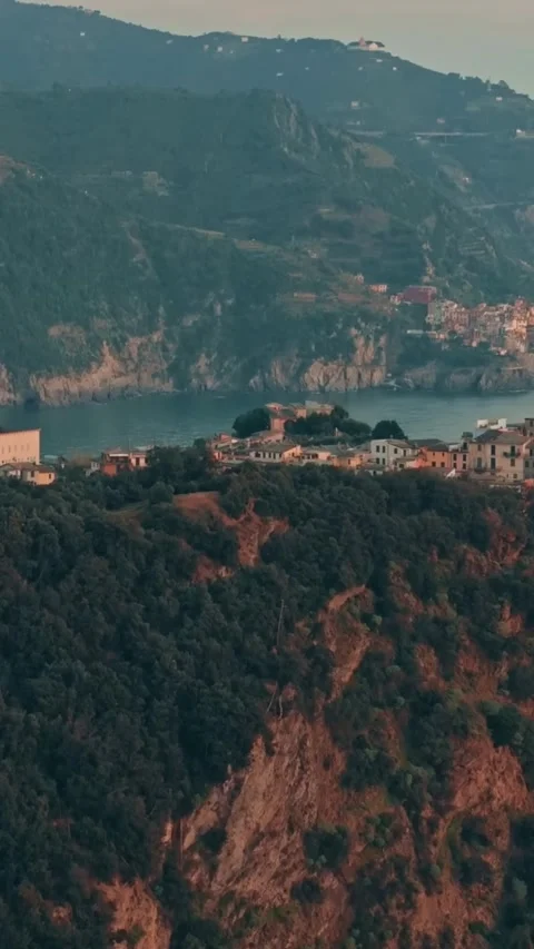 Aerial drone view of Cinque Terre Italy coastal villages and scenic landscapes. Stock Footage 335018725