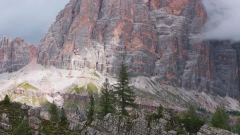 Aerial drone view of Cinque Torri rock formations in the Dolomites, Italy Stock Footage 320254426