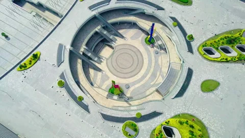 Aerial Drone View of Circular Modern Urban Plaza with Escalators Stockbeeldmateriaal 335427831