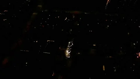 Aerial Drone View Of A City With Exploding Fireworks In Evening Sky. Stock Footage 233250509