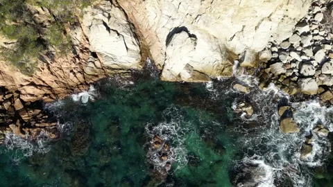 Aerial drone view, clean blue sea water, rocks and cliffs, Spanish landscape, 4K Stock Footage 274480906