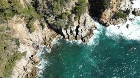 Aerial drone view, clean blue sea water, rocks and cliffs, Spanish landscape, 4K Stock Footage 274817161