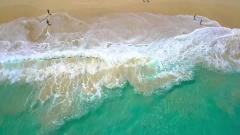 Aerial drone view on clean sandy beach. Shore of Indian Ocean. Blue waves fall 動画素材 246188485
