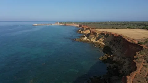 Aerial drone view of cliffs at Roche, natural park on the coast in Cadiz Stock Footage 143656576