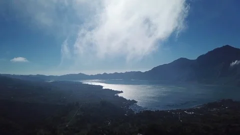 Aerial drone view of clouds with mountains in the background Stock Footage 111759270