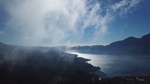 Aerial drone view of clouds with mountains in the background Stock Footage 111759273