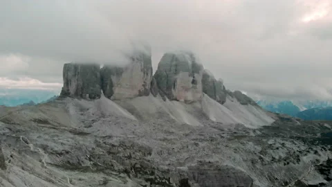 Aerial drone view of clouds in Tre Cime di Lavaredo. Three peaks in Dolomites Stock Footage 151294073