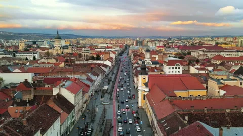 Aerial drone view of Cluj centre at sunset, Romania. Cityscape, walking people, Stock Footage 196205180