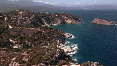 Aerial drone view of the coastline with cliffs and the sea with waves in Crete, Stock Footage 260420508