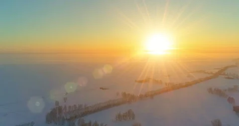 Aerial drone view of cold winter landscape with arctic field, trees covered with Stock Footage 127362801