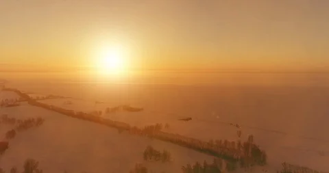 Aerial drone view of cold winter landscape with arctic field, trees covered with Stock Footage 129242804