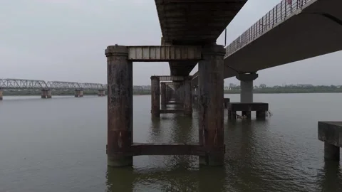 Aerial drone view of concrete bridge pillars and elevated transportation inf Stock Footage 345463535