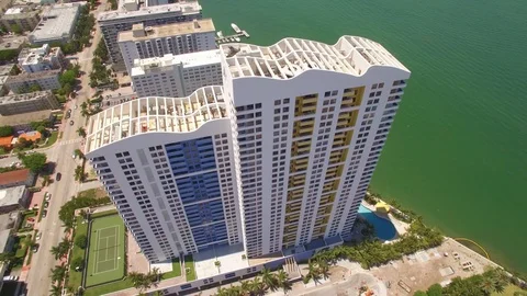 Aerial drone view of condominium skyscraper building in Miami beach Video stock 100866033