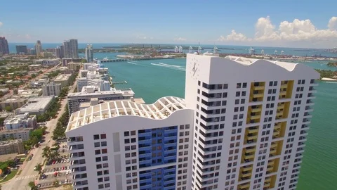 Aerial drone view of condominium skyscraper building in Miami beach Stock Footage 100866061