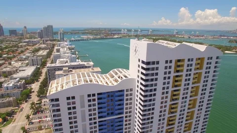 Aerial drone view of condominium skyscraper building in Miami beach Stock Footage 100866111