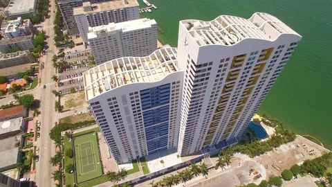 Aerial drone view of condominium skyscraper building in Miami beach Stock Footage 100866131