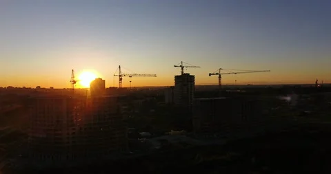 Aerial drone view of construction of a new residential complex at sunset 스톡 동영상 169412656