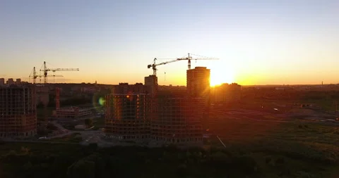 Aerial drone view of construction of a new residential complex at sunset 스톡 동영상 169414121