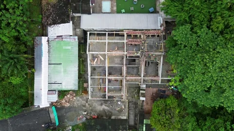 Aerial Drone View of Construction Site with Workers, Scaffolding, Cranes, and Stock Footage 308045279