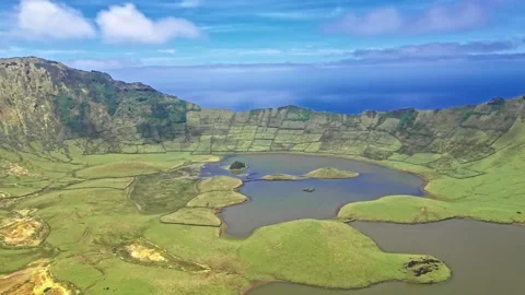 Aerial Drone View of Corvo Volcanic Crater with Lakes and Green Fields in Azores Stock Footage 337732148