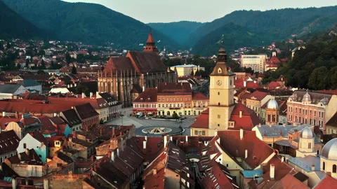 Aerial drone view of The Council Square in Brasov, Romania. Old city centre with Stock Footage 250363376