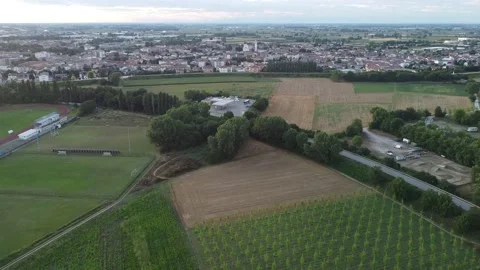 Aerial drone view of crop fields and Viadana city, Italy Stock Footage 160002642