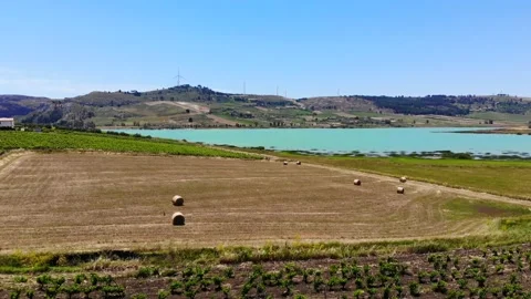 Aerial drone view with cultivated fields of lake Arancio, Sicily 4k Video stock 148753067