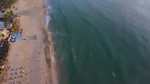 Aerial drone view of Da Nang coastline with gentle cinematic movement at sunrise Stockbeeldmateriaal 340536451