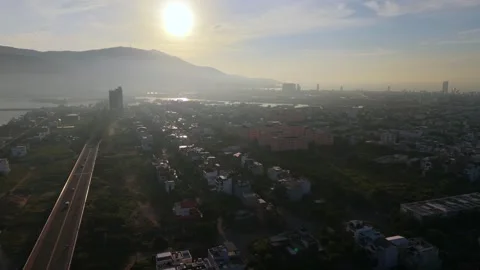 Aerial drone view of Da Nang city at sunrise with Thuan Phuoc Bridge, Vietnam Stock Footage 340874691