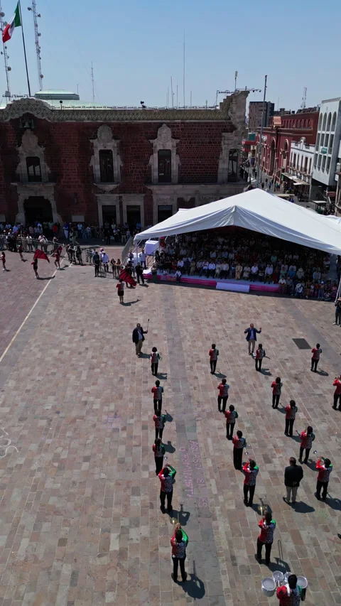 Aerial drone view of dance formations and the government palace during the San Stock Footage 342062646