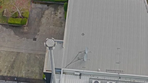 Aerial Drone View of Data Centre Rooftop with Satellite Dish and Air Vídeo Stock 342037415